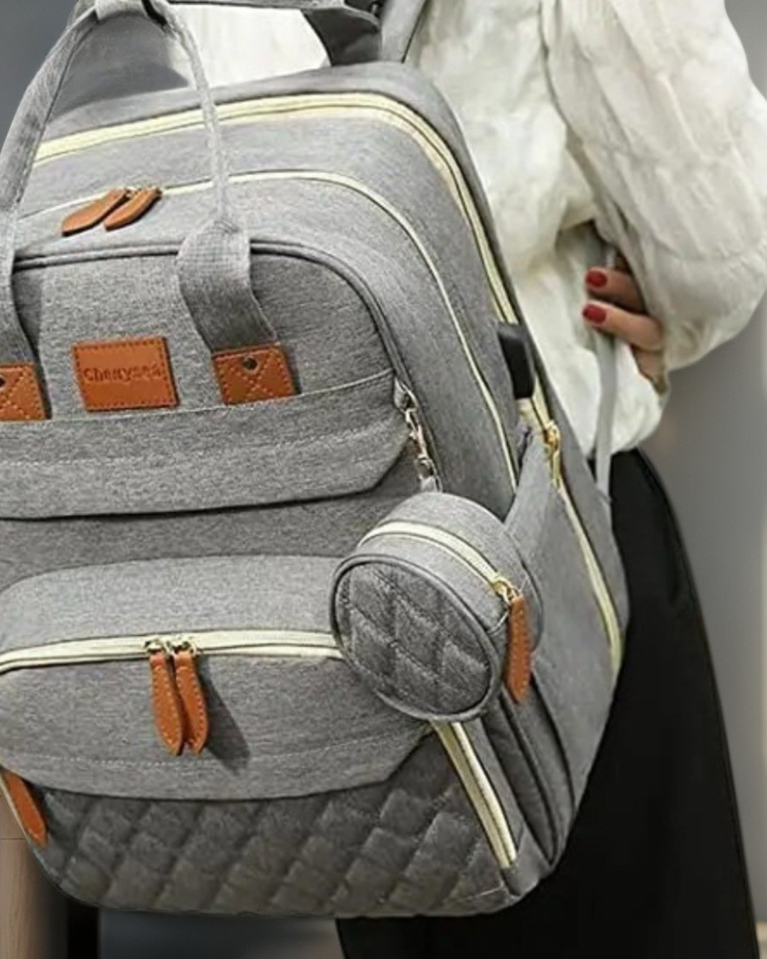 The 3-in-1 Backpack That Will Traform Your Bab's Travels!- Foldable Nappy Backpack,Travel Cot & Changing Station With USB Charger.